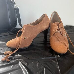 suede like heeled booties with tassles